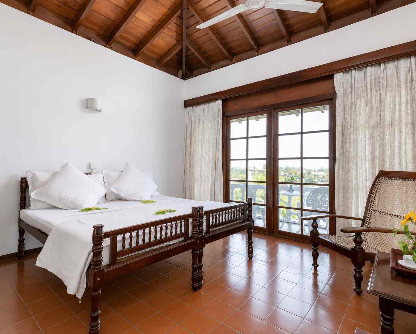 Standard Double Room at Closenberg Hotel with timber ceiling and sea-facing balcony